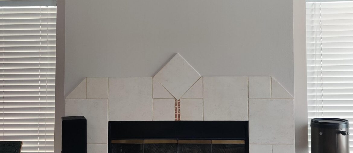 Any suggestion on what to put/hang above my apartment fireplace? It's is on the side of my living room, doesn't turn on, no furniture is pointing at it, but I'm wondering if I should put something above it as I decorate my new apartment. Is it best to just leave blank?