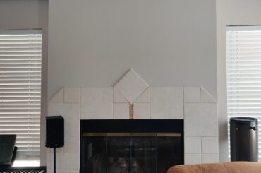 Any suggestion on what to put/hang above my apartment fireplace? It's is on the side of my living room, doesn't turn on, no furniture is pointing at it, but I'm wondering if I should put something above it as I decorate my new apartment. Is it best to just leave blank?