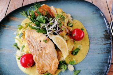 Cod with mashed potatoes on sweet mustard sauce