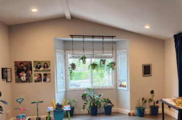 Need help with decorating this walls around the bay window.