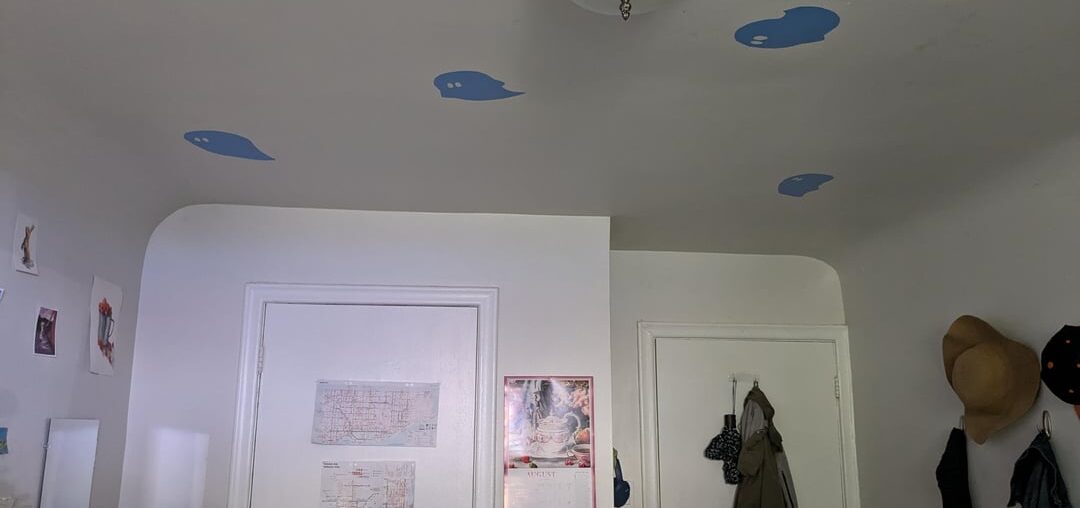 I want to paint the walls or put on contact wallpaper, but the ceiling corners are rounded. How to go about this?