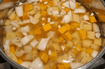 Pumpkin and potato soup in the making