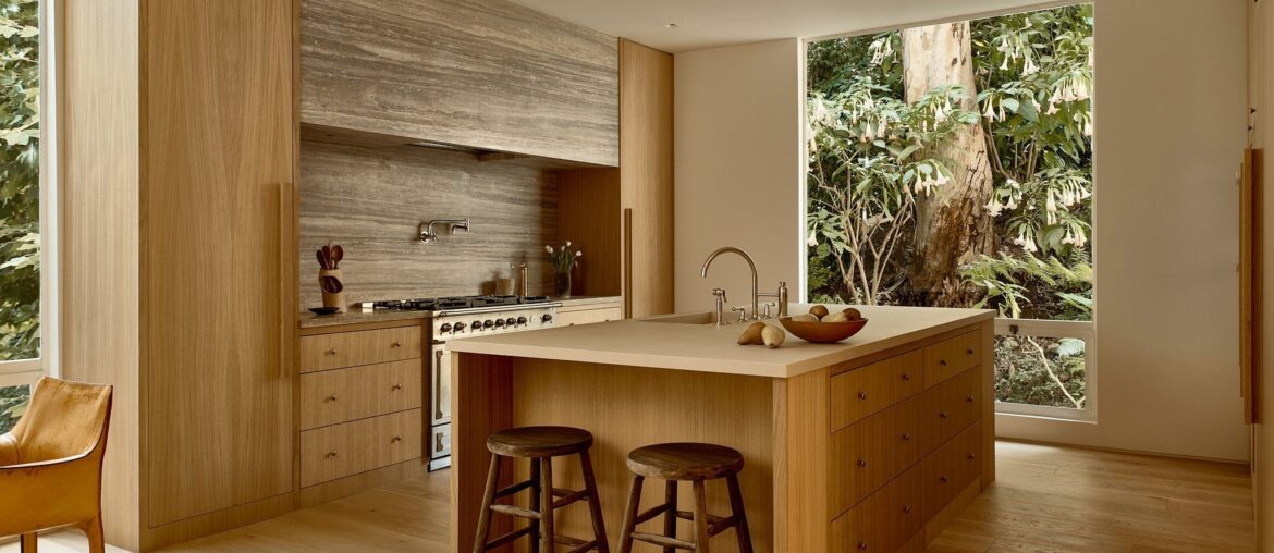 Kitchen with views of lush greenery in a renovated 60s residence, Brentwood, Los Angeles [2048x1365]