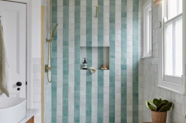 Bathroom with stripe patterns formed with handmade tiles, Herne Hill, South London, UK [1333x2000]
