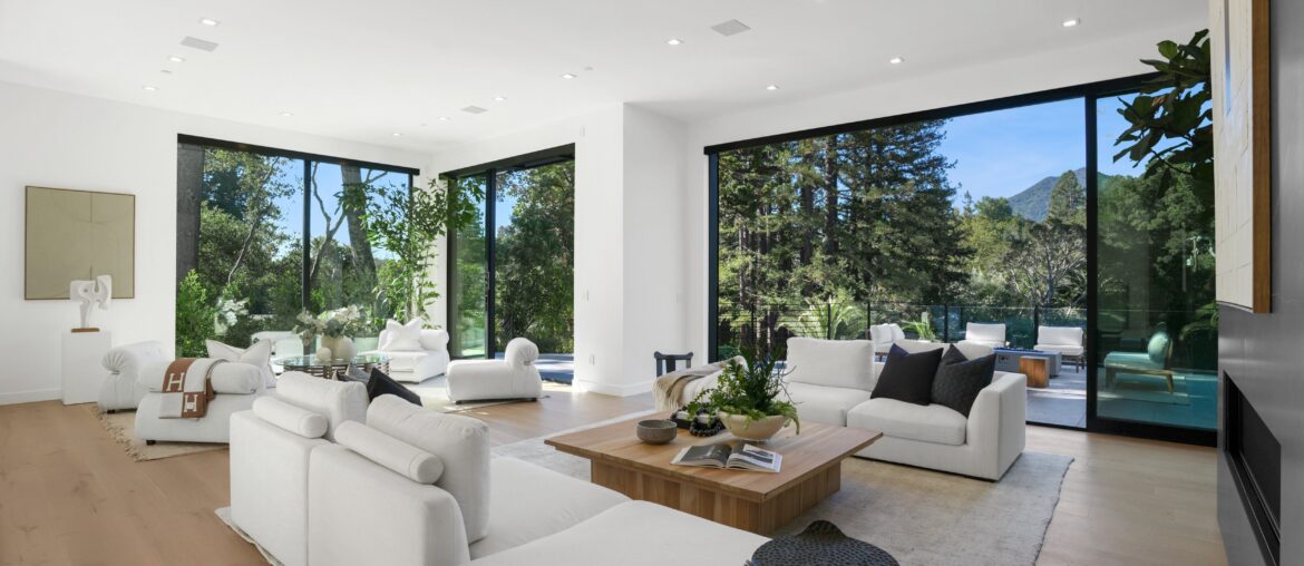 Spacious Living Room with Floor To Ceiling Sliding Doors Surrounded By Lush Landscape with View of Mount Tamalpais in Ross, CA [5000×3333]
