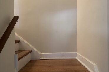 How would you decorate this stairway landing.