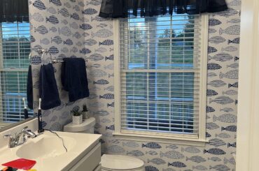 I used this fish-patterned wallpaper to make a wall for my bathroom. It was fairly easy to use but would have been easier if I had help; it stuck to me, my hair, and itself. If I had another person to help, it would have gone easier. Looks great! I've received many compliments.