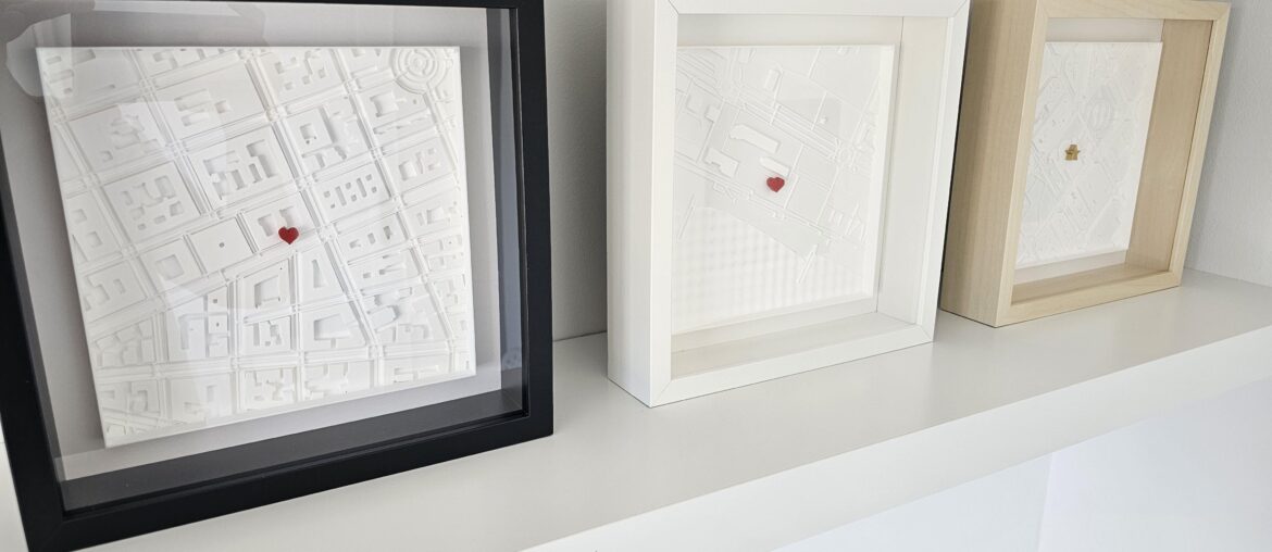 Made these 3D city map thingies - kinda dig how they look on the shelf!