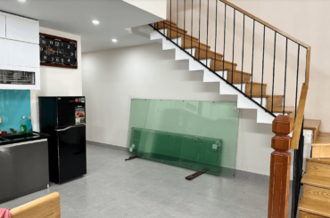 Please help, what should I put under the stair? It's quite empty