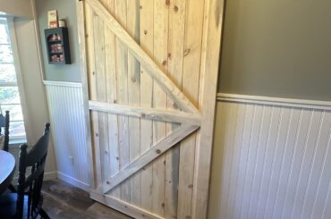 Should I paint the barn door white or leave it alone