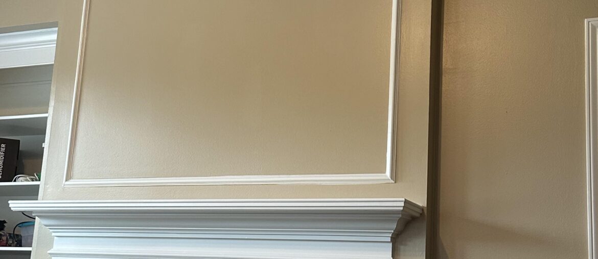 What decor do I put in this big square above mantle?