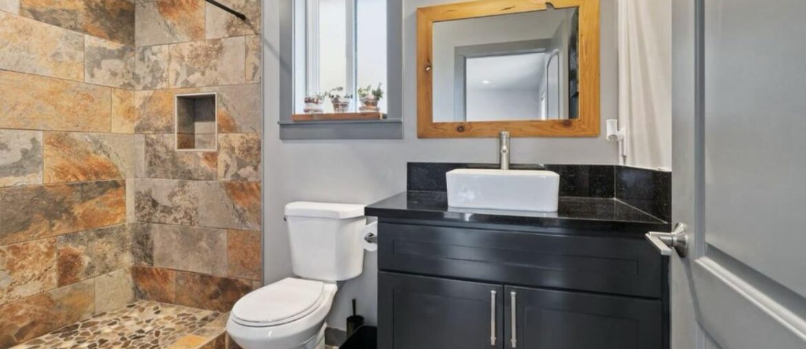 What paint color would compliment orange tiled shower?