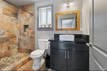 What paint color would compliment orange tiled shower?