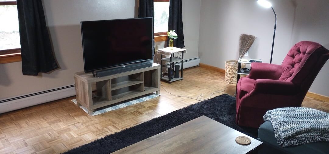 Living room feels boring and just kinda off, any suggestions?