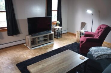 Living room feels boring and just kinda off, any suggestions?