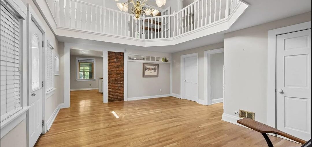 Ideas on how to decorate this 2 level foyer?