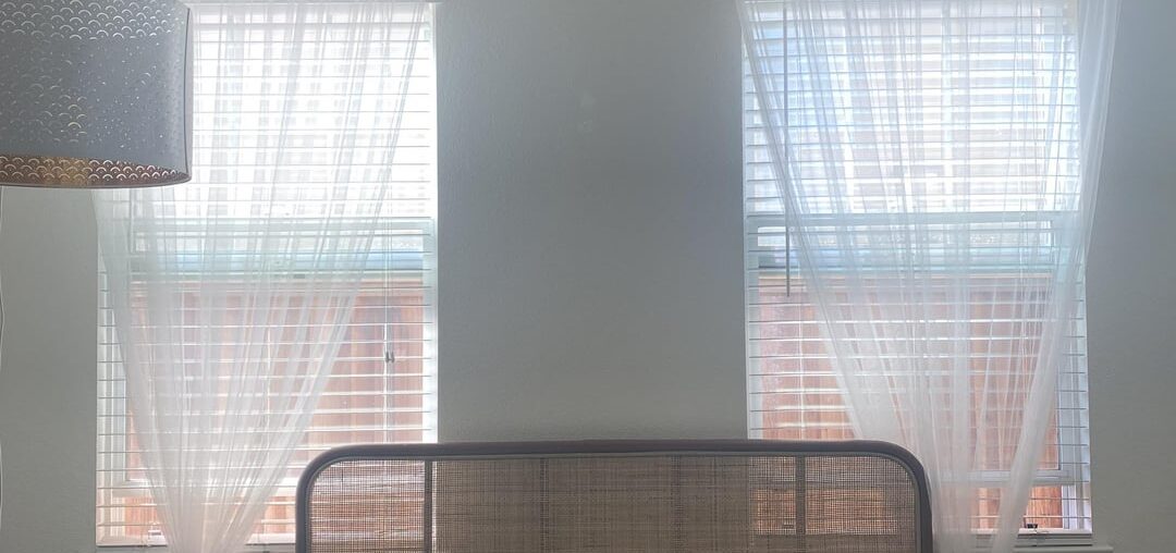 Headboard by window or other wall?