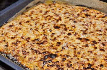 Inspired by Alsacian Flammkuchen, but richer and with a not too thin Pizza dough