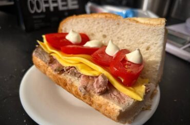 Pâté, cheese and tomato sandwich