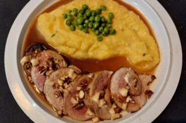 Pork loin roll, stuffed with goat cheese, apple, pecans and apple syrup. With pumpkin mash and a cider jus.