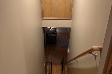 Attic access in stairwell. Tips to make it look more appealing?
