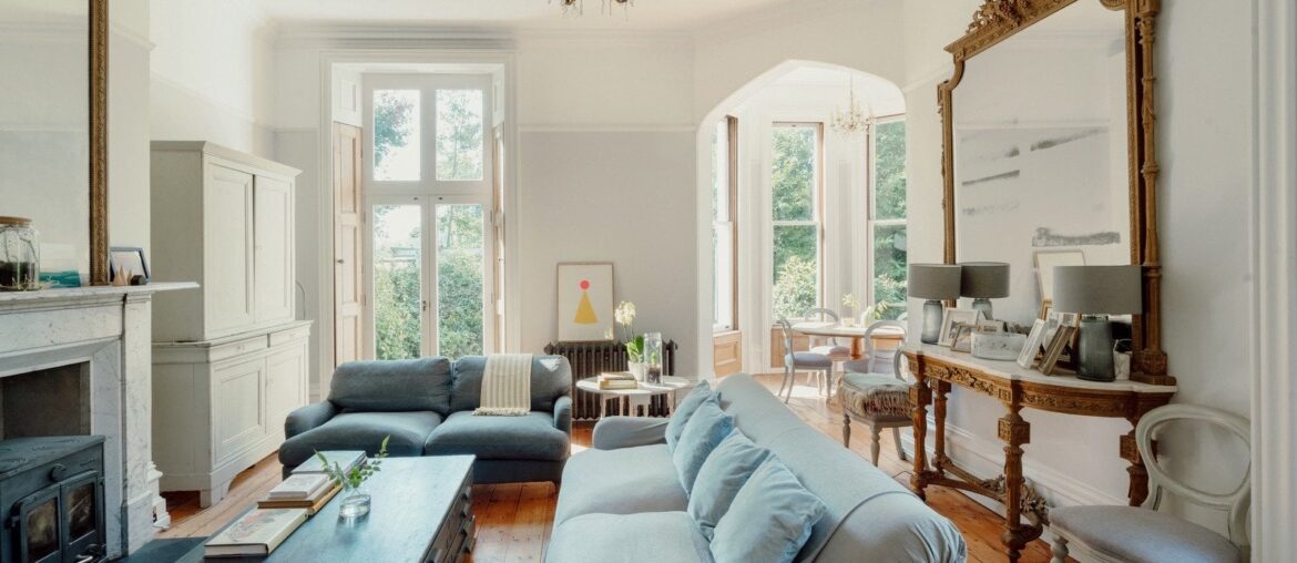 Living space in an 1840s Victorian hunting lodge with a turret used as a dining room, Bramford, Suffolk, England [1600x1067]