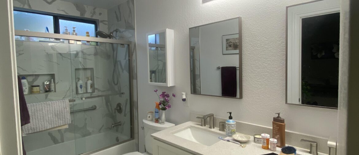 How to make a new but sterile bathroom cozy?