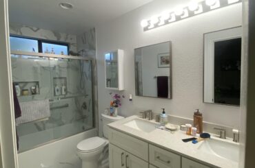 How to make a new but sterile bathroom cozy?
