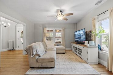 How should I re-organize my living room? (There is a furnace in front of the double windows)