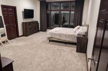 We're remodeling our bedroom and aren't sure what to do with the large space. Thinking about an accent wall by the bed. Any ideas would be appreciated!