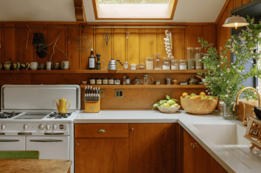Douglas fir cabinetry kitchen with a small skylight in a renovated 1930s hunting cabin, Topanga, Los Angeles County, California [784x1044]