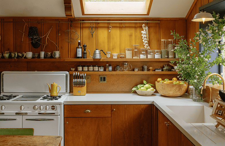 Douglas fir cabinetry kitchen with a small skylight in a renovated 1930s hunting cabin, Topanga, Los Angeles County, California [784x1044]