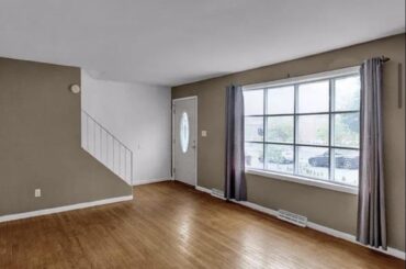 We need help, this living room isn’t the biggest but how would situated. (Different wall color, where and how would you mount a tv, definitely rug right?, furniture)