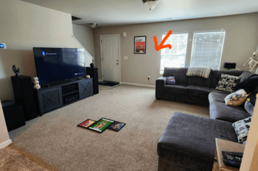 Help with empty space between couch and door.