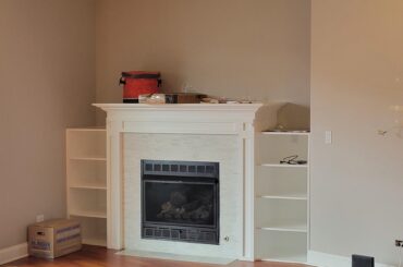 Suggestions to zhuzh up the space around the fireplace?