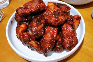 At home Korean fried chicken with tteok and oven-baked garlic parm fries