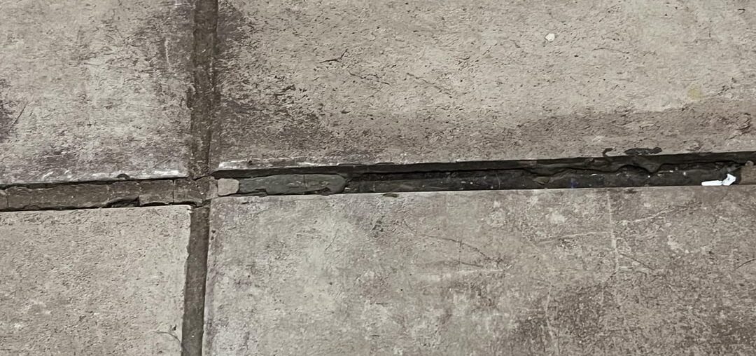 Can this tile floor be saved/repaired?