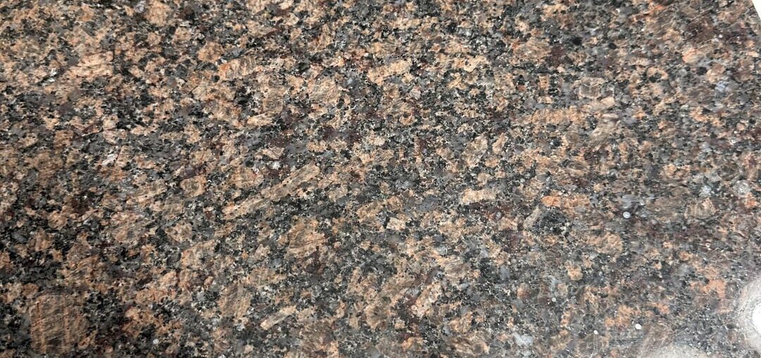 Short of replacing all the granite/tiles/floors, how do you deal with this dated bathroom?