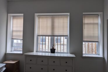 How should I hang curtains over these windows? 1 rod?