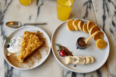 Brunch in Lisbon. Pancakes and apple crumble with greek yogurt