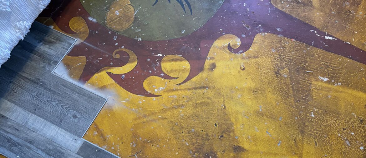 We’re removing the current floor and look what was up under it!