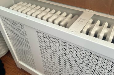 Radiator cover with cardboard?