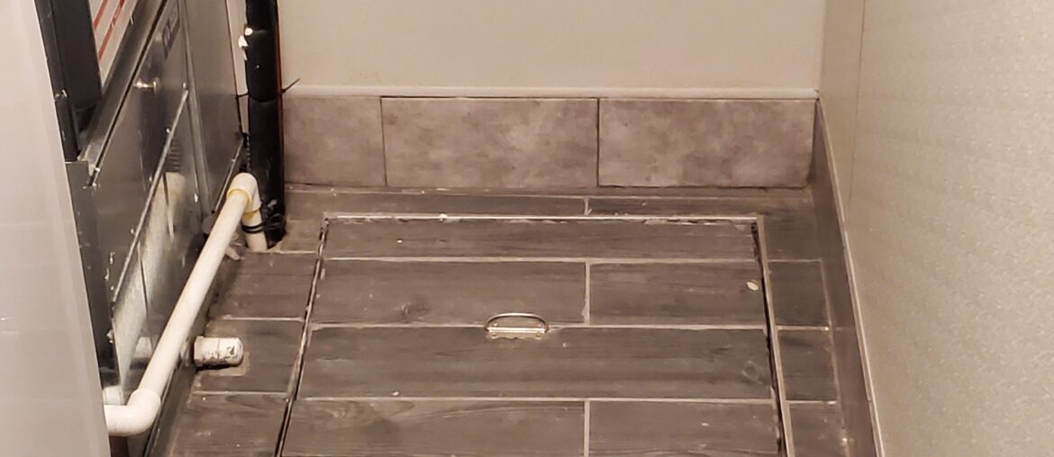 Suggestions on what to do to cover this crawl space door so it's difficult for someone to get in?