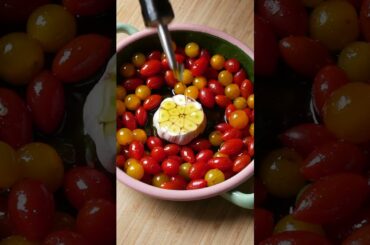 Slow roasted garlic and tomatoes with olive oil and balsamic glaze on toast with burrata