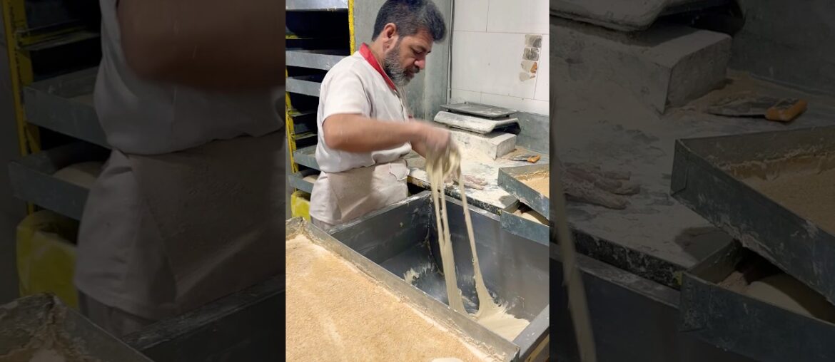 The skill of making a circle of barbarian bread dough #iranianbread #shortsvideo