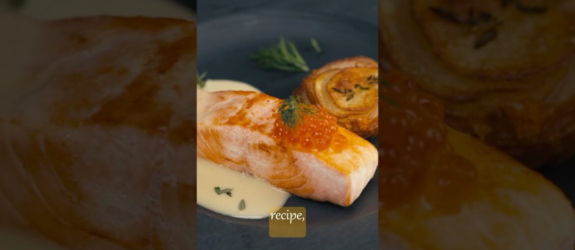 A  juicy salmon steak with crispy potatoes and delicate Beurre Blanc sauce.
