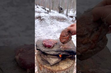 Delicious RIBEYE STEAKS cooked on a hot stone, FRENCH FRIES and ROMESCO sauce. #outdoors #cooking