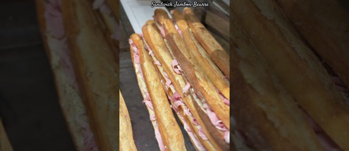 A sandwich jambon-beurre is a classic French sandwich made with a crispy baguette, butter, and ham.