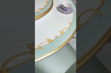 This French round dining set in blue and gold feels like it stepped out of a Rococo painting.