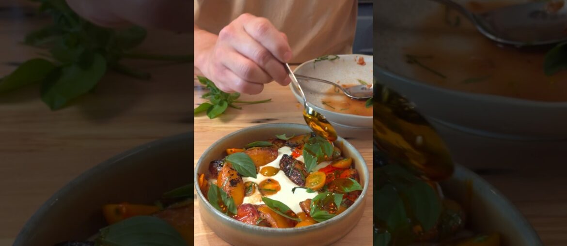 Seared Peaches, sungold tomatoes, basil, on whipped ricotta with chorizo chili oil.